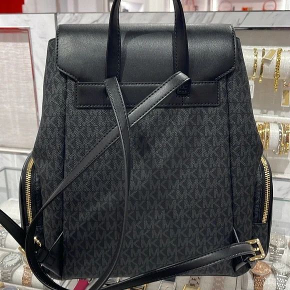 Michael Kors Jet Set Large Logo Backpack
Black 
NWT - Picture 9 of 16